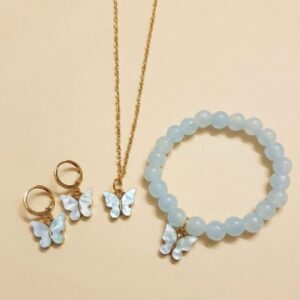 Kids' blue butterfly jewelry set with shell butterfly pendant necklace, matching hoop earrings, and aqua blue bead stretch bracelet with butterfly charm
